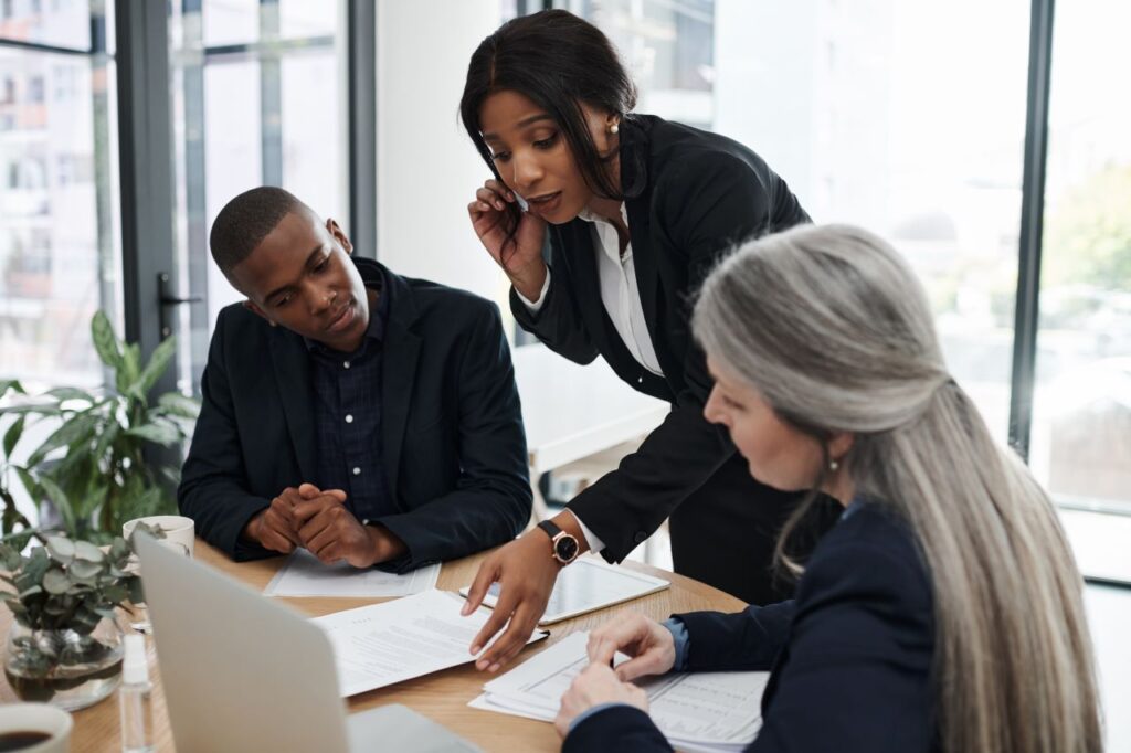 business manager woman handing out papers