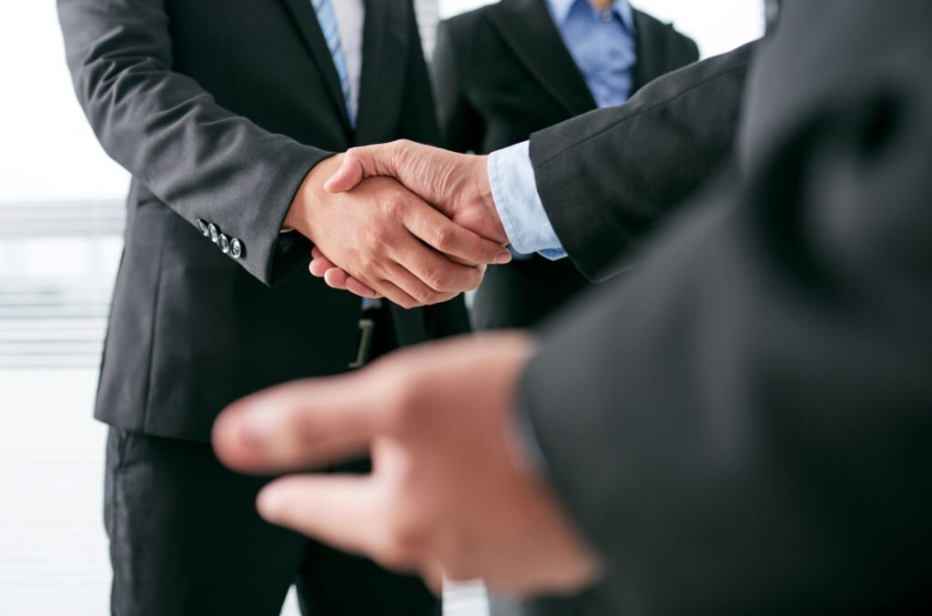 business men shaking hands