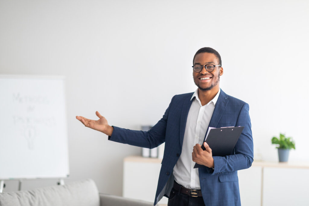 career consultant inviting visitor into office