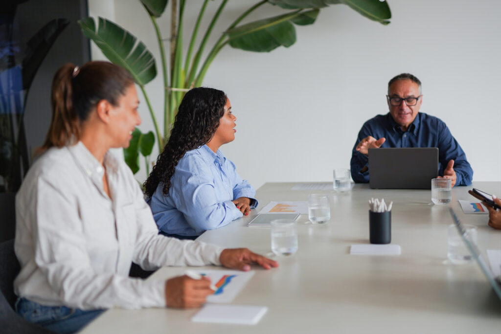 Multiracial business people working inside office - Meeting, entrepreneurs and multi generational colleagues concept